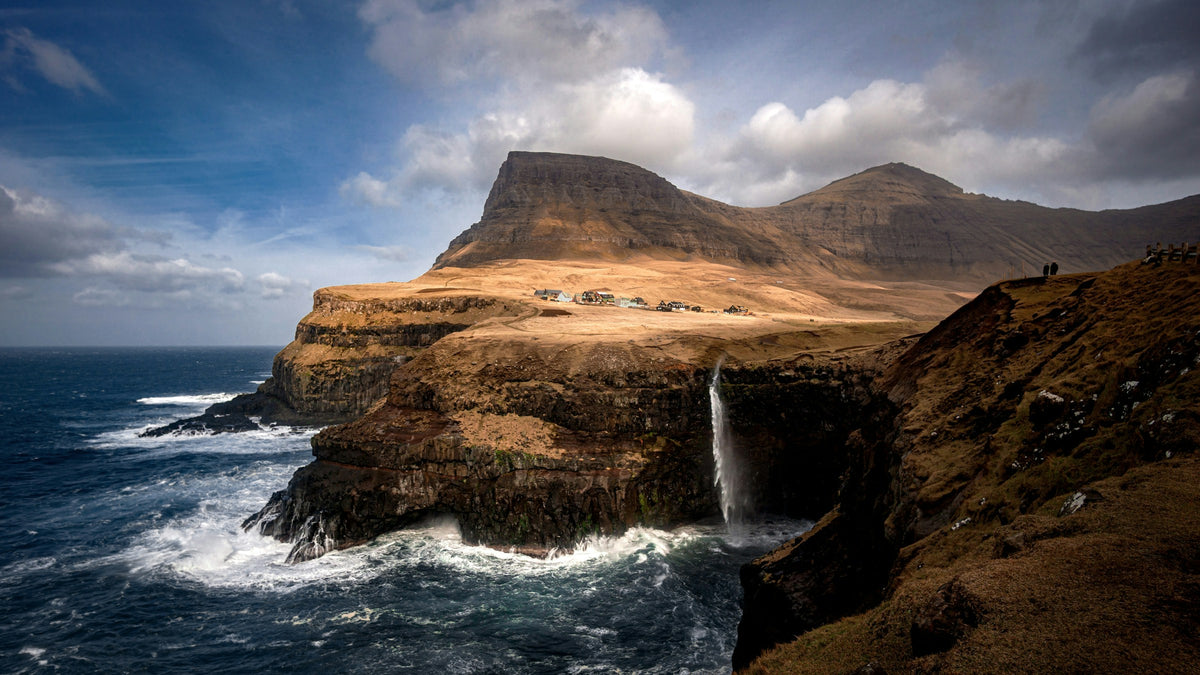 Waterfall over sea cliffs, Faroe Islands