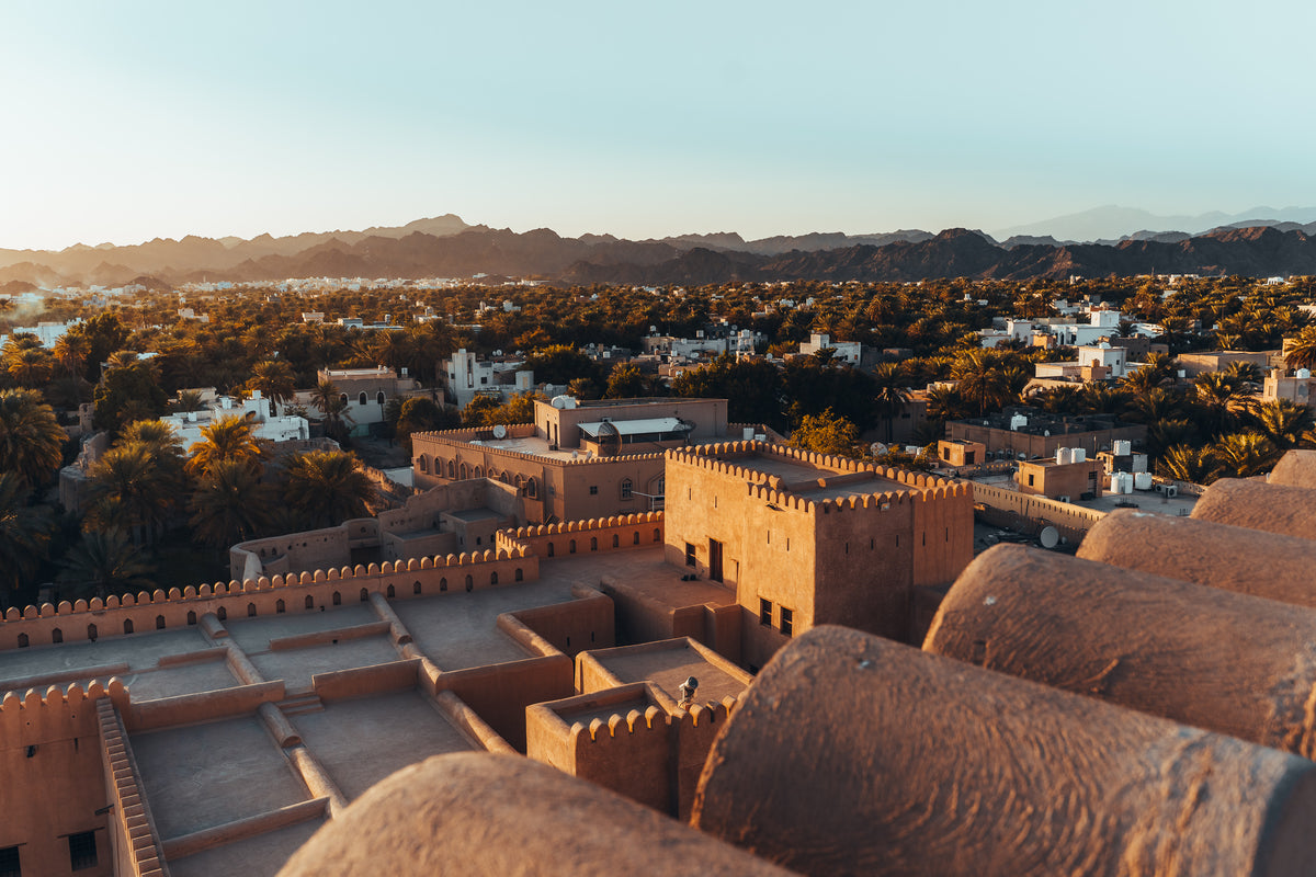 Old town rooftops and mountains, Oman