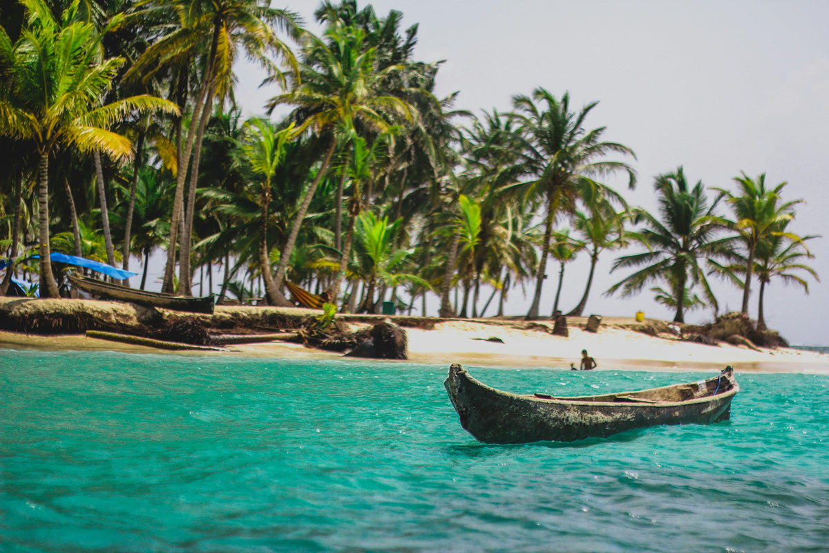 Boat on a palm beach, Panama