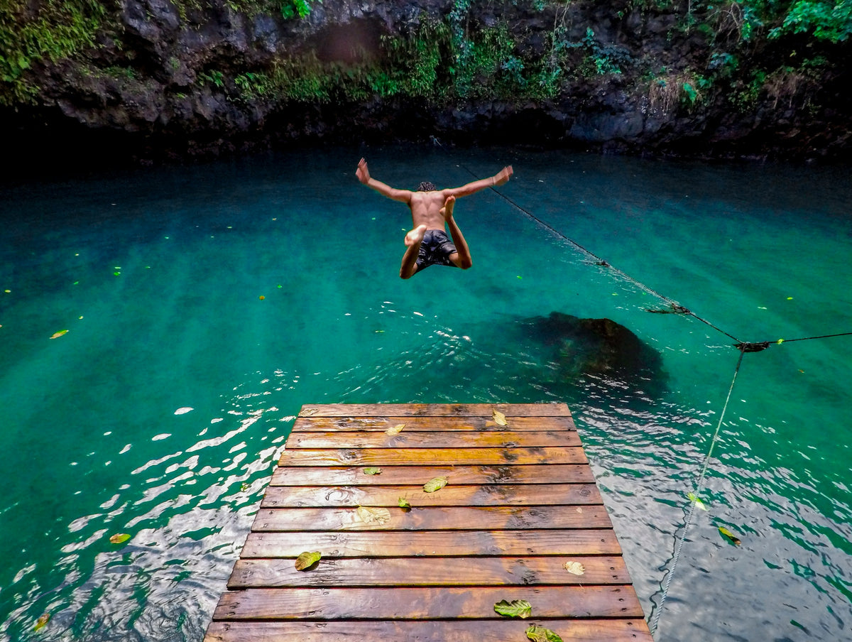 Natural pool with a wooden jetty, Samoa