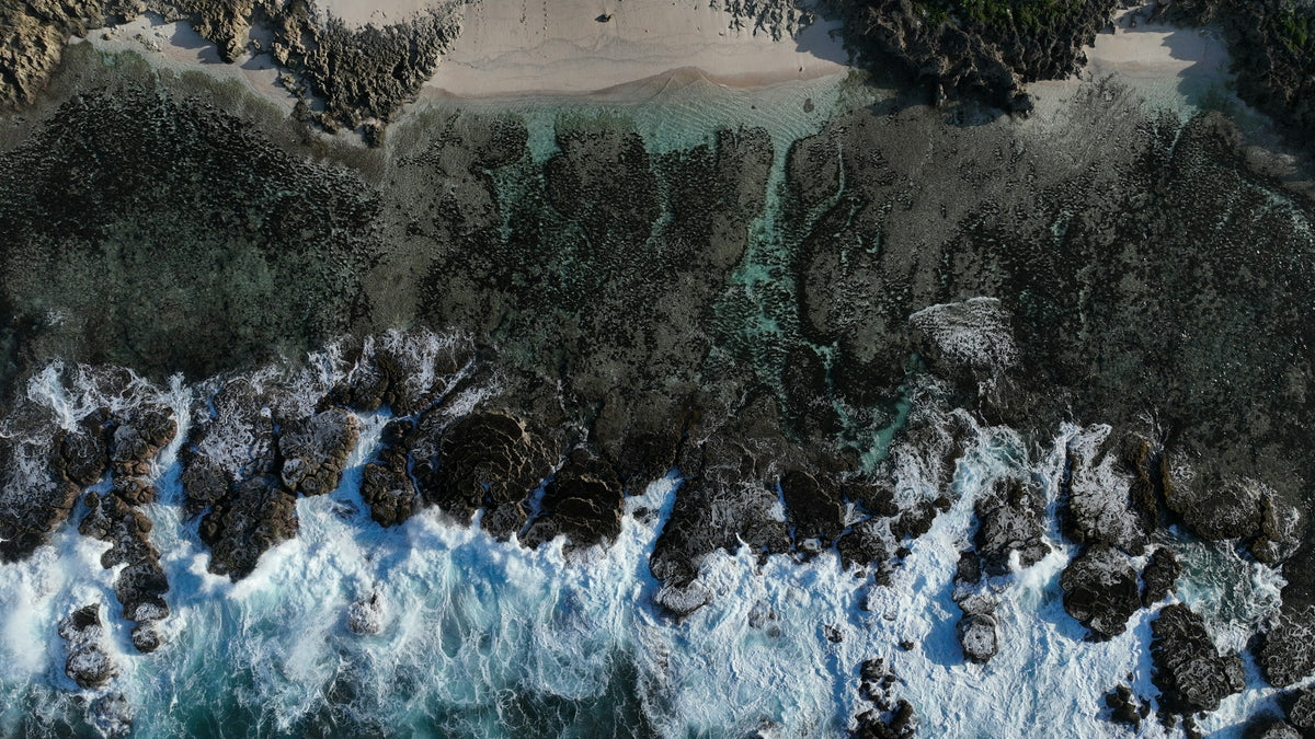 Waves on a rocky coast from above, Tonga