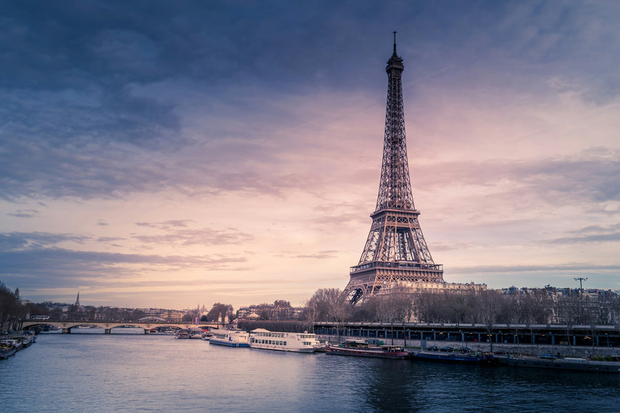 The Eiffel Tower above the Seine at dusk, Paris