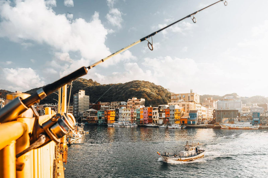 The colourful houses of Zhengbin Port across the water in Keelung, Taiwan