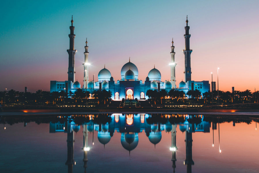 The white domes and minarets of the Sheikh Zayed Grand Mosque in Abu Dhabi